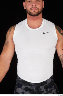 Grigory dressed sports upper body white tank top 0001.jpg